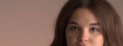 Женские жилеты из меха енота